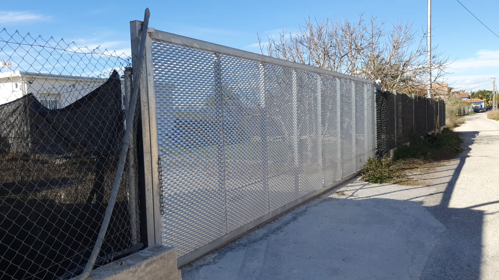 Puerta corredera automática en Elche