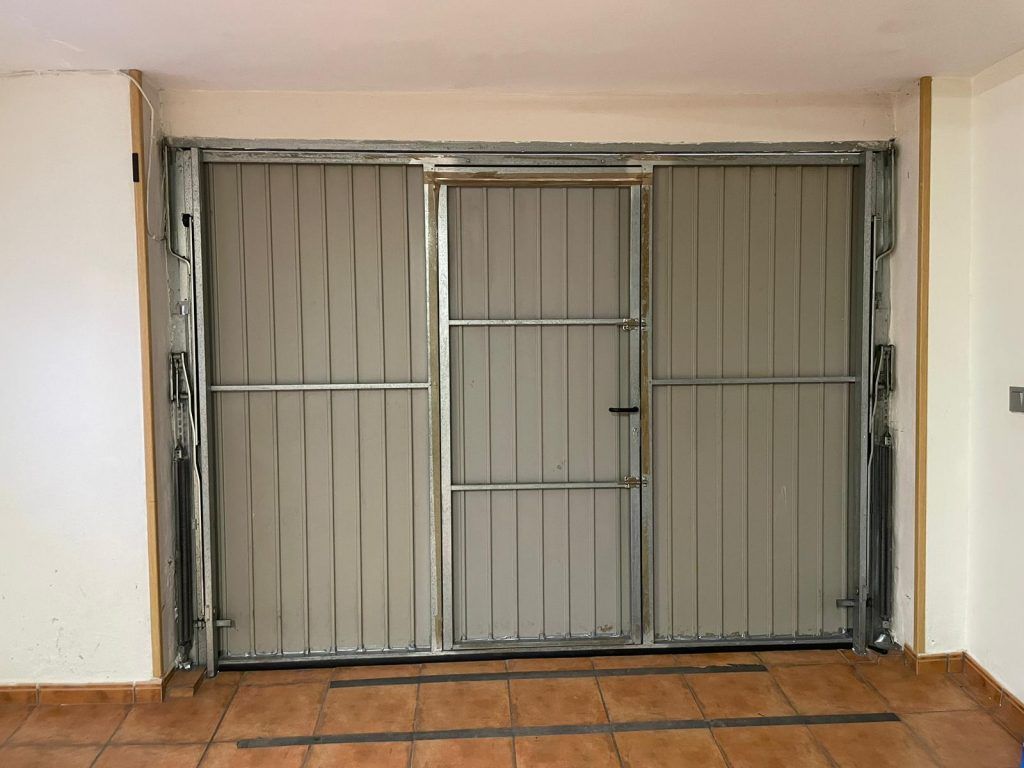 Puertas automáticas de garaje antivandálicas